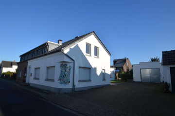 Familienfreundliche Doppelhaushälfte mit großer Garage und Garten in gefragter Lage, 47443 Moers, Doppelhaushälfte